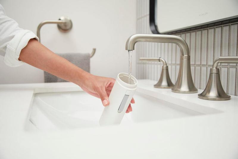 Kohler PureWash M050 Portable Bidet Sprayer, Honed Black, Travel Bidet, Compact Design for Easy Transport with Carrying Strap, Multi-setting Spray Functions, Holds Water for Up to One Minute
