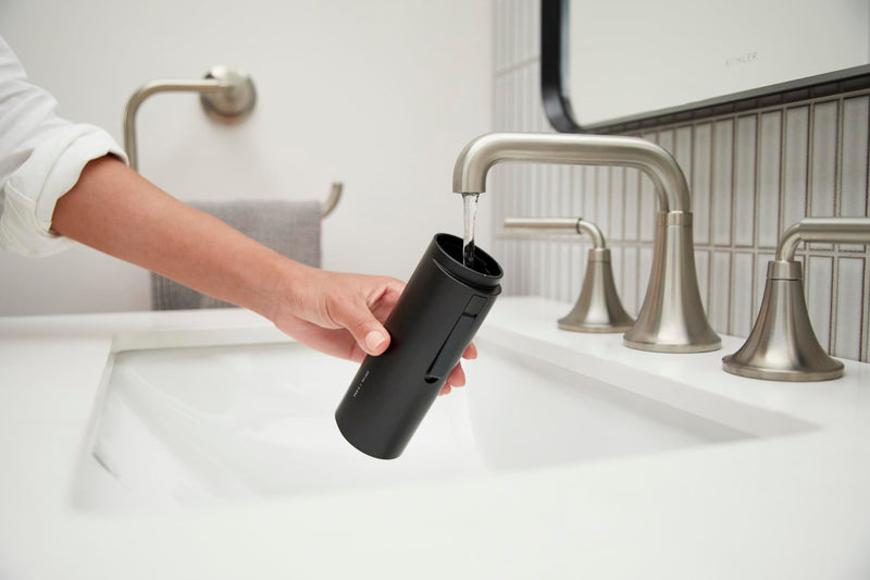 Kohler PureWash M050 Portable Bidet Sprayer, Honed Black, Travel Bidet, Compact Design for Easy Transport with Carrying Strap, Multi-setting Spray Functions, Holds Water for Up to One Minute