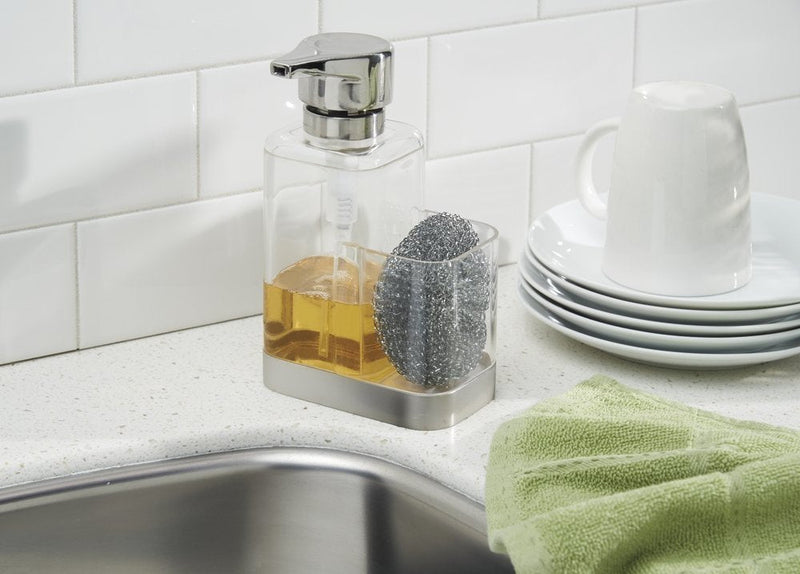 mDesign Modern Plastic Kitchen Sink Countertop Liquid Hand Soap Dispenser Pump Bottle Caddy with Storage Compartment - Holds and Stores Sponges, Scrubbers and Brushes - Clear/Brushed