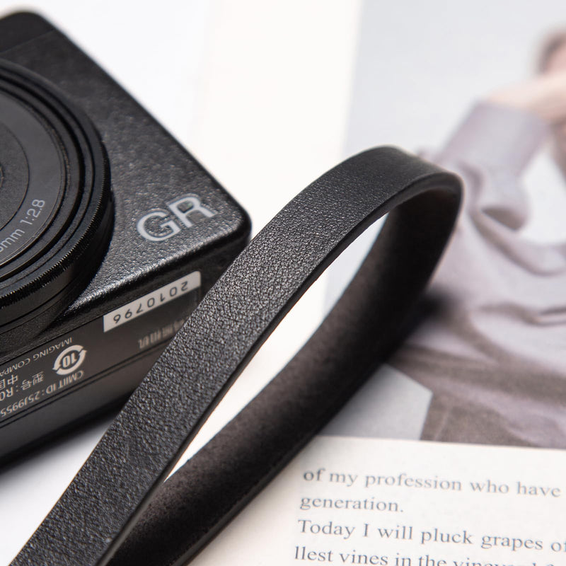 Nappa Leather Quick Release Camera Wrist Strap | Genuine Nappa leather with a soft, lightweight feel and secure quick release; fits most compact cameras. Black