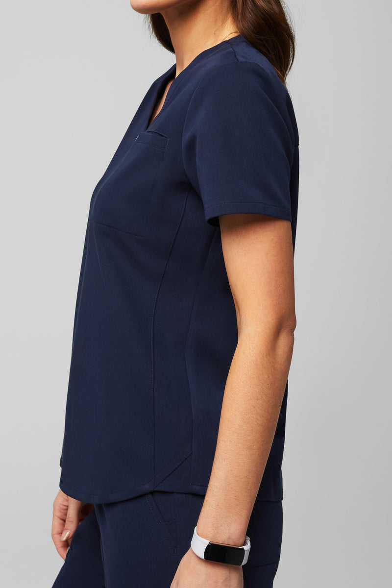 Fabletics Women's Vital 1-Pocket Scrub Top - MotionTech, Wrinkle-Resist, Chest Pocket, Anti-Shrink, Semi-Slim Fit Medium Navy