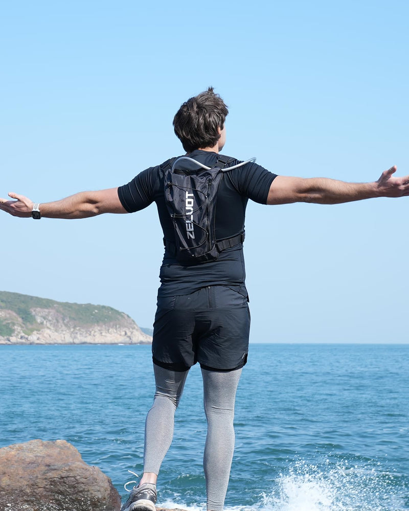 Running Vest with 2L Water Bladder, USA Original Patent, Lightweight Adjustable Chest Pack with Gear Holder, Reflective Running Hydration Vest for Women Men for Marathon Black Medium-Large