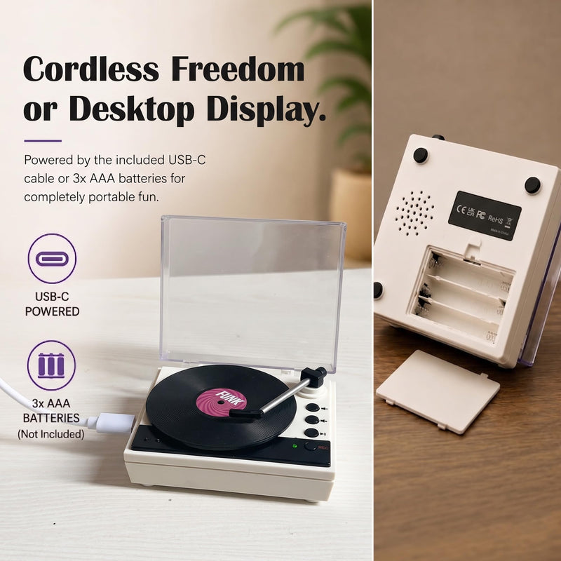 Mini Record Player with Voice Recording, 4 Discs, Auto-Spinning Desk Decor | Includes 3 music discs and 1 blank disc. All 4 discs record. Recording over music erases it permanently. Black
