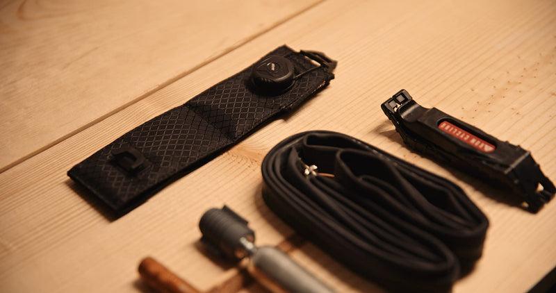 KOM Cycling Mountain Bike Frame Carrier Strap, so You can Carry Your Spare Tube and Puncture Repair Tools with You Everywhere — Most Secure Option on The Market Stealth Black