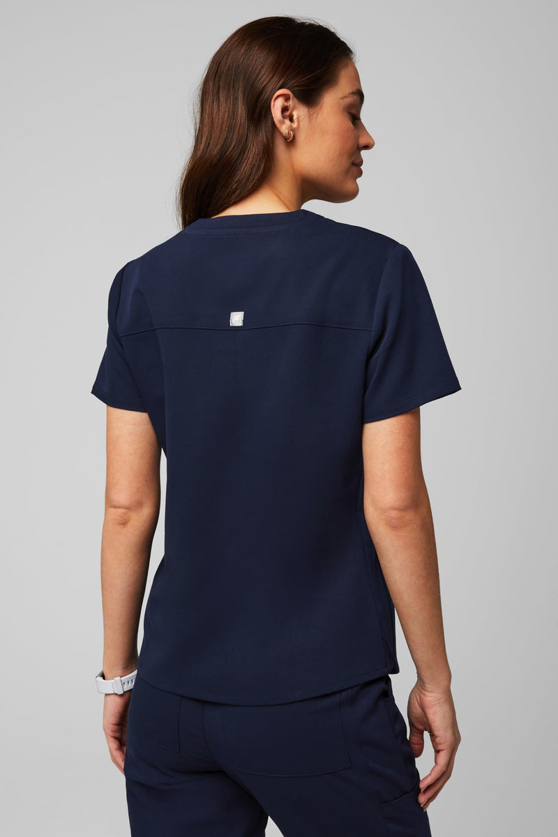 Fabletics Women's Vital 1-Pocket Scrub Top - MotionTech, Wrinkle-Resist, Chest Pocket, Anti-Shrink, Semi-Slim Fit Medium Navy