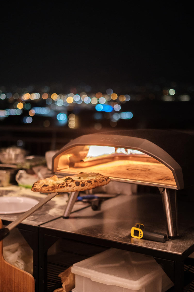ooni Pizza Turning Peel - 7 Inch Aluminum Perforated Pizza Peel, Lightweight Metal Pizza Turner with Long Handle, Pizza Tools, Pizza Oven Accessories