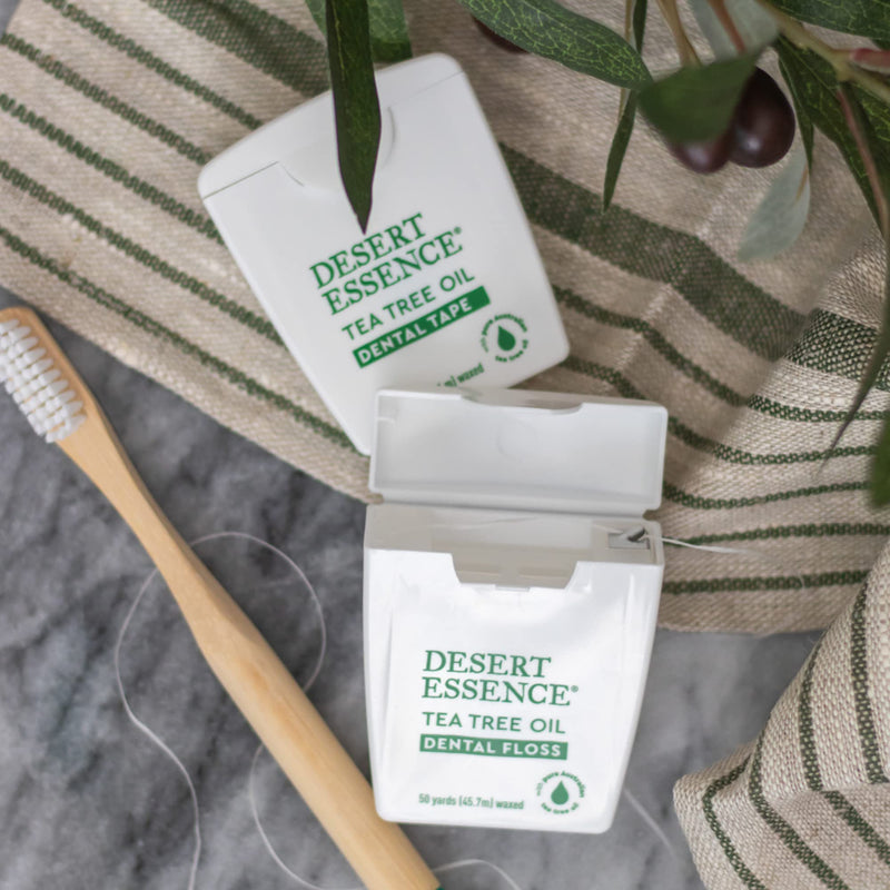 Desert Essence Tea Tree Oil Dental Tape - 12 Count (Pack of 1) - Naturally Waxed w/Beeswax - Thick Flossing No Shred Tape - On The Go - Removes Food Debris Buildup - Cruelty-Free Antiseptic 1080 Foot (Pack of 1)