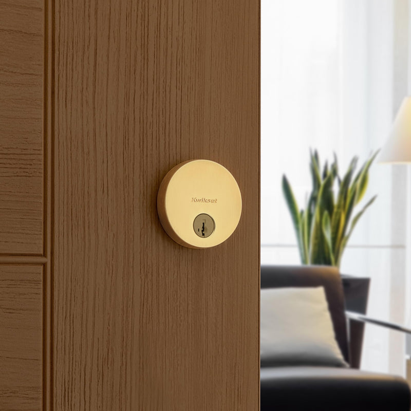 Kwikset Uptown Deadbolt Lock, Satin Brass Round Exterior Keyed Front Entry Door, Pick Resistant SmartKey Rekey Security, Single Cylinder Dead Bolt, with Microban Protection 0.5" x 2.63" x 2.63"