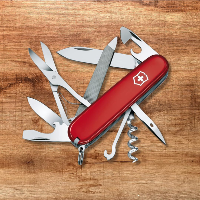 Victorinox Mountaineer Swiss Army Knife, 18 Function Pocket Knife,Red | light and compact tool Includes scissors and a nail file with metal saw