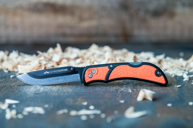 OUTDOOR EDGE 3.5" RazorLite EDC Knife. Pocket Knife with Replaceable Blades and Clip. The Perfect Hunting Blade for Skinning Deer. Blaze Orange with 6 Blades Orange (6 Blades)