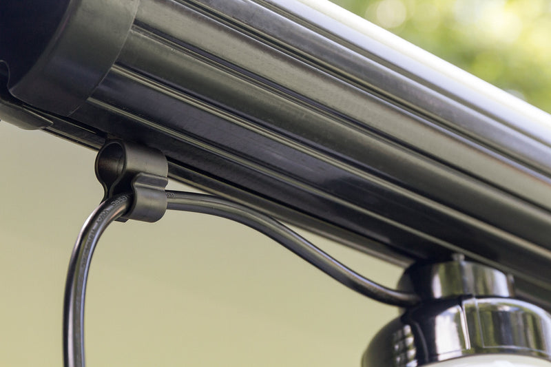 Camco Awning Clip for Rope Light, 10 Pack - Slides into Awning Roller Bar Channel to Create a Convenient Hook - Two Hanging Positions - Holds Party Lights, RV Lights, String Lights - Black (42708)