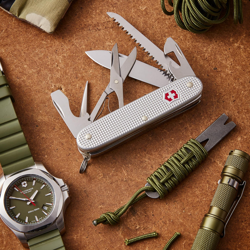 Victorinox Farmer X Alox Swiss Army Knife - 10 Function Pocket Tool, Silver | Swiss Made Stainless Steel Multi-Tool with Wood Saw, Scissors, Large Blade, Reamer, Bottle Opener and Durable Alox Scales 10 Functions