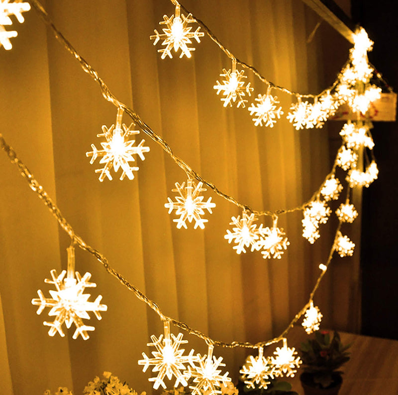  [AUSTRALIA] - FUNPENY 80 LED Christmas Snowflake String Lights, 32ft Snow Decorative Light with 8 Modes, Battery Operated Christmas Fairy Light for Xmas Party Decor Indoor Outdoor, Warm White (Battery Not Include)